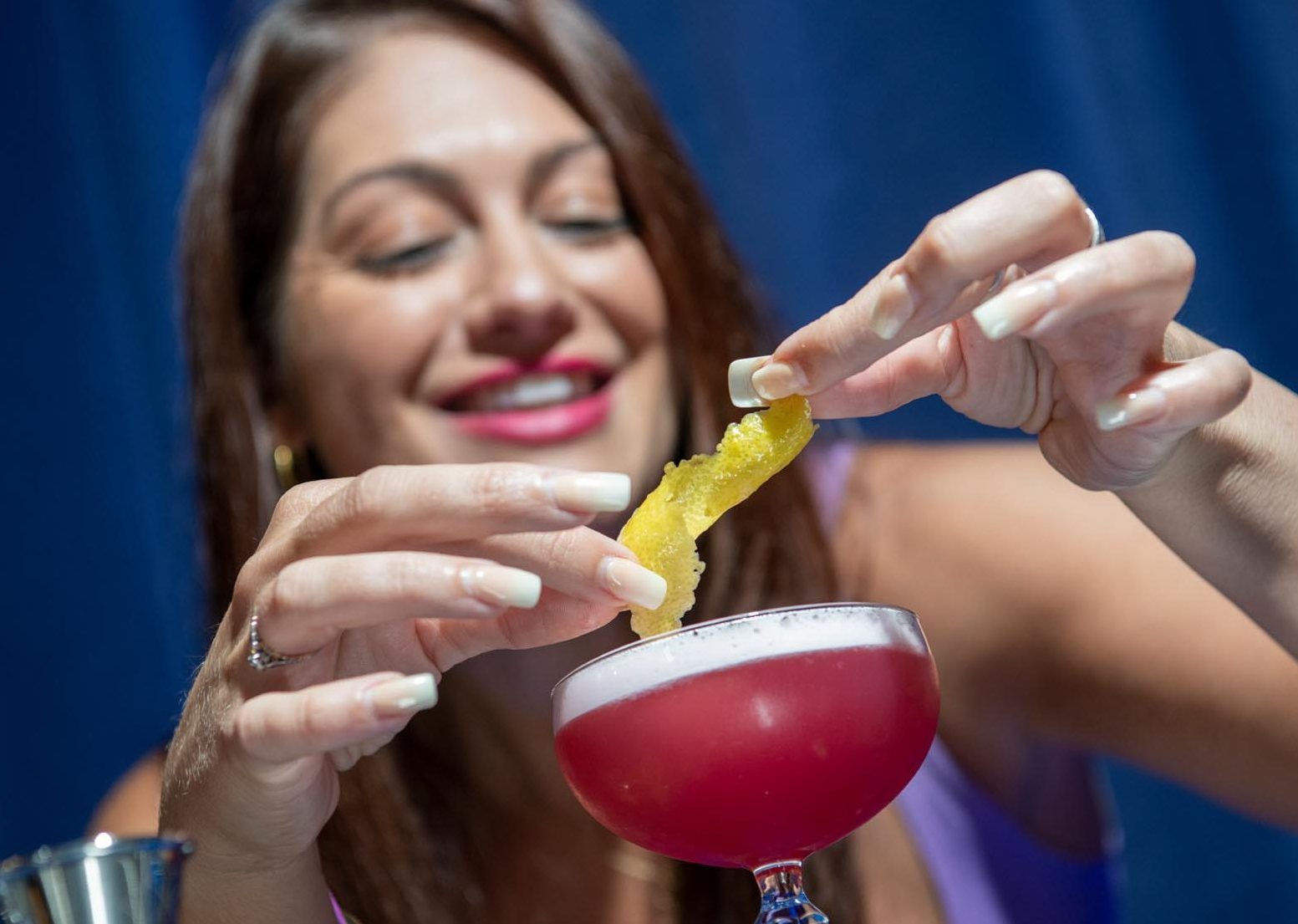 Cocktail Masterclass-Christmas lady making a cocktail